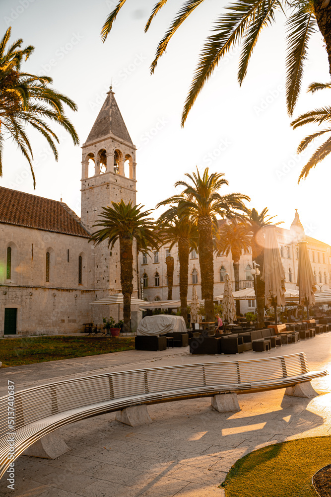 street of Croatian city Trogir with sun star in the tree