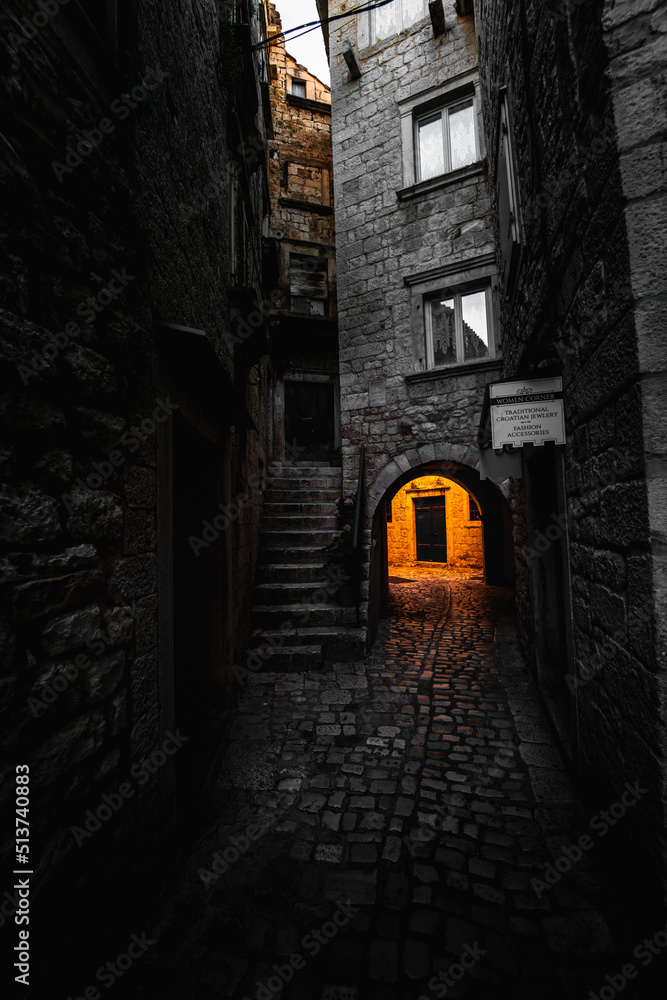 Fototapeta premium Empty morning streets in mediteranean historical city Trogir in Croatia