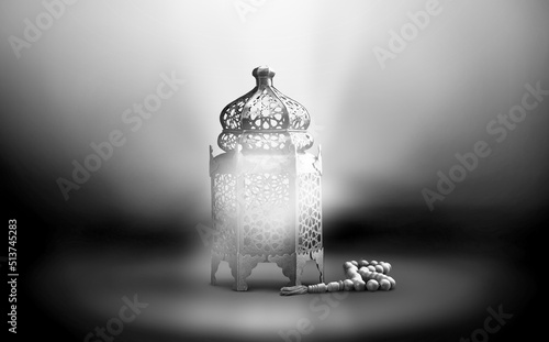 Ornamental Arabic lantern with burning candle on white-black background. Muslim holy month Ramadan Kareem.