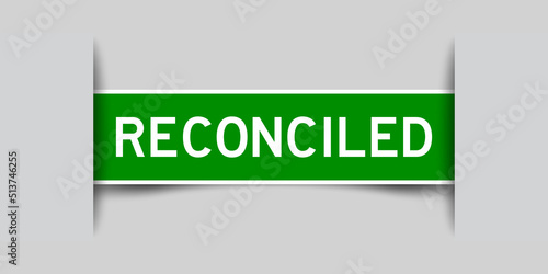 Green color square label sticker with word reconciled that inserted in gray background