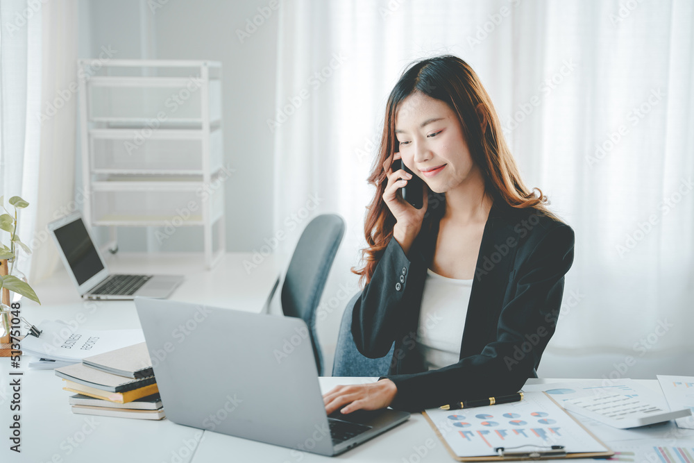 Asian woman working on customer documents, finance, accounting, taxes in the office. Asian woman working on customer documents, finance, accounting, taxes in the office.