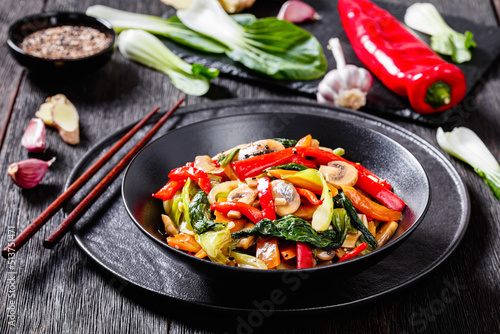 Obraz na płótnie Stir Fry Vegetables in black bowl, top view