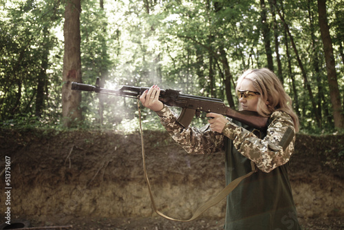 Ukrainian woman fires a Kalashnikov