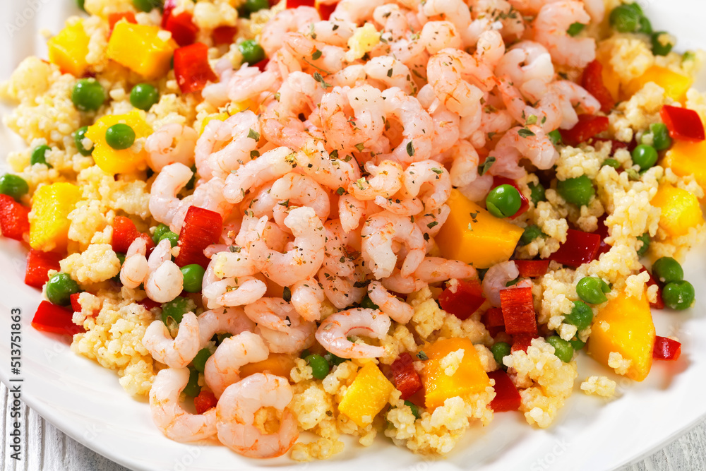 shrimps and millet pilaf with mango and veggies shrimps and millet pilaf with mango and veggies