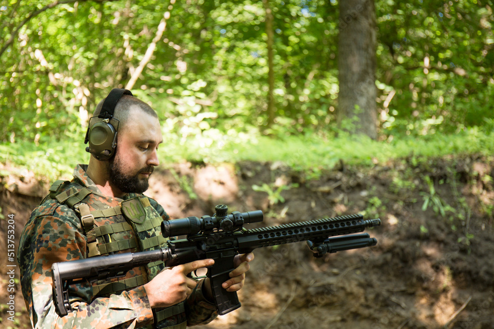 Ukrainian defender with a machine gun Ar-15