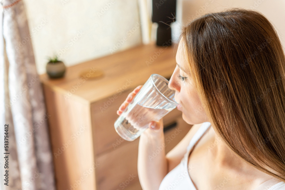 Drinking water pregnant woman. Young pregnancy mother drink water