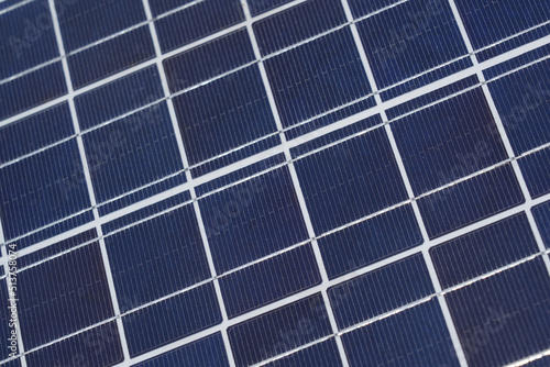 Close up of polycrystalline photovoltaic cells in a solar panel. Cost effective  green energy alternative for power generation