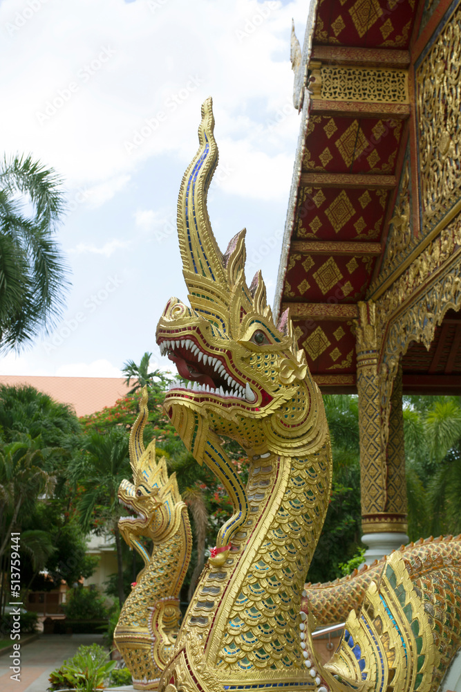 golden serpent in a thai temple in the north