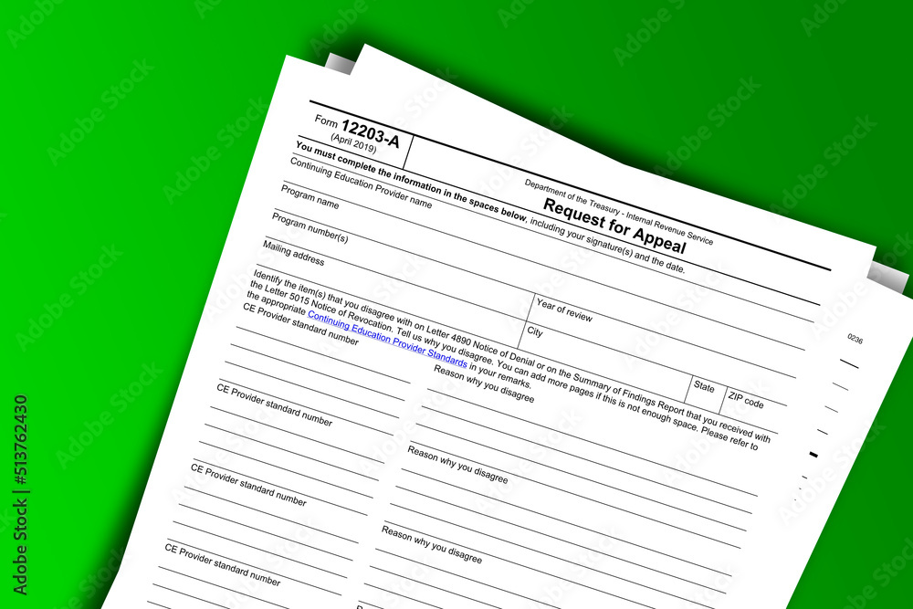 Form 12203-A documentation published IRS USA 43682. American tax document on colored