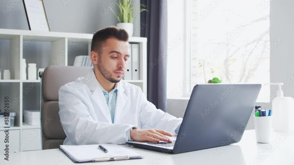 Doctor Works in the Medical Office. Workplace of a Professional Therapist in a Hospital or Clinic. Healthcare and Medicine Concept. Doctor Works in the Medical Office. Workplace of a Professional Therapist in a Hospital or Clinic. Healthcare and Medicine Concept.