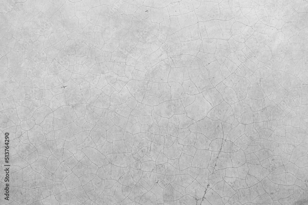 white grunge cement or concrete painted wall texture. White cement stone concrete plastered stucco wall painted. The cement crack wall background abstract gray concrete texture for interior design.