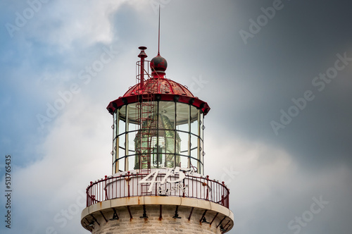 top view of the oldest lighthouse in Gaspe Peninsula, Cap des Rosiers, Quebec. Highest in Canada it has been standing for over 150 years photo