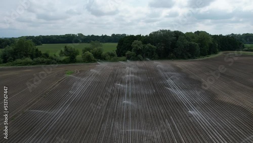 intensive agriculture and vegetables production in Polabí region near Poděbrady city,Czech republic,Europe,aerial scenic panorama landscape view, water irigation by sprinklers photo