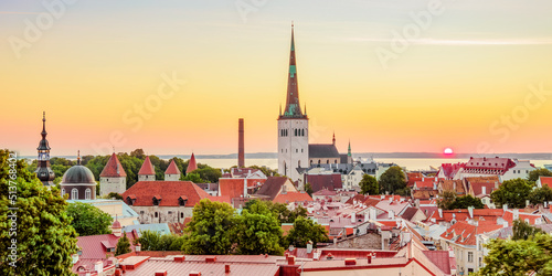 View over the Old Town towards St. Olaf's Church at sunrise, UNESCO World Heritage Site, Tallinn, Estonia