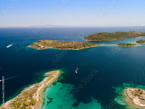 Drone shot above Sithonia, Chalkidiki peninsula, with small islands and clear waters, Crete, Greek Islands, Greece photo