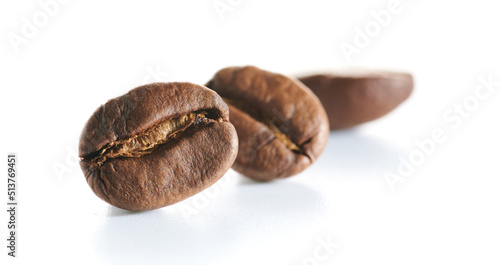 Wallpaper Mural Roasted coffee beans isolated close up on white background, clipping path Torontodigital.ca