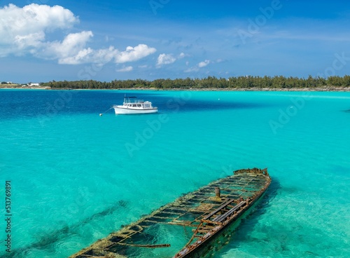 The wreck of the Sea Fern deliberately sunk in 1930 as a breakwater for a deep sea diving expedition, Castle Harbour, Bermuda, Atlantic photo