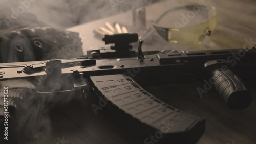Military ammunition. On the table. Smoke.