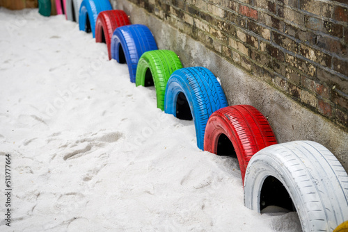 A bunker decorated with colorful tires