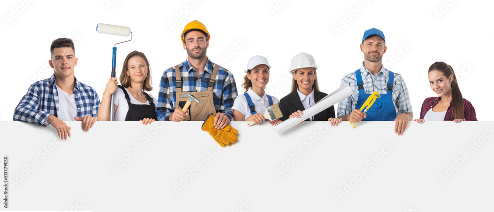 Obraz premium Construction workers holding blank billboard