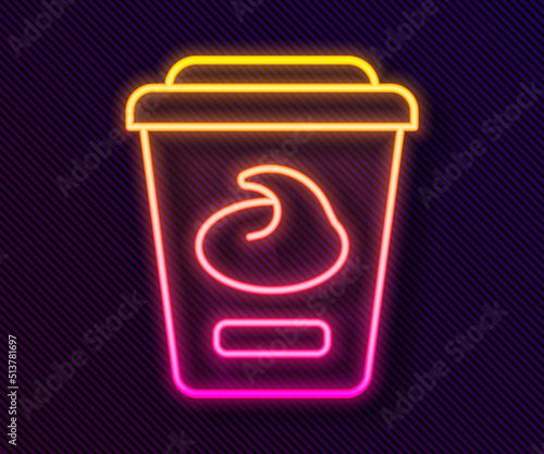 Glowing neon line Yogurt container icon isolated on black background. Yogurt in plastic cup. Vector