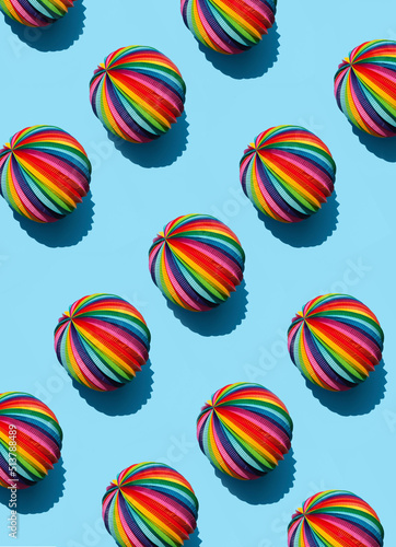 Geometric pattern of Rainbow Sphere on a bright blue background, top view