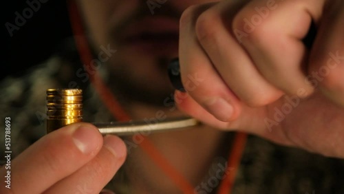 Super close up shot of caucasian man lighting pipe and smoking from it. Slowed down footage of male inhaling cannabis from tube. Concept of addiction from smoking and difficulty of rehabilitation
