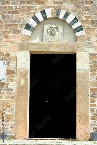 porta della chiesa medievale di Cstelfalfi (Montaione). Firenze photo