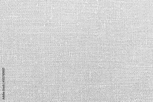 White burlap fabric sackcloth texture background white gray color. The texture of the material is light. Sackcloth