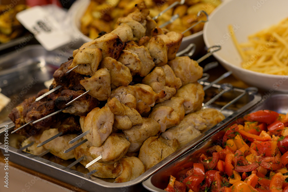 meat shish kebab on the grill. traditional outdoor barbecue picnic. grilled meat bbq meat shish kebab on the grill. traditional outdoor barbecue picnic. grilled meat bbq