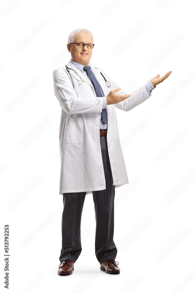 Full length portrait of a mature male doctor presenting Full length portrait of a mature male doctor presenting