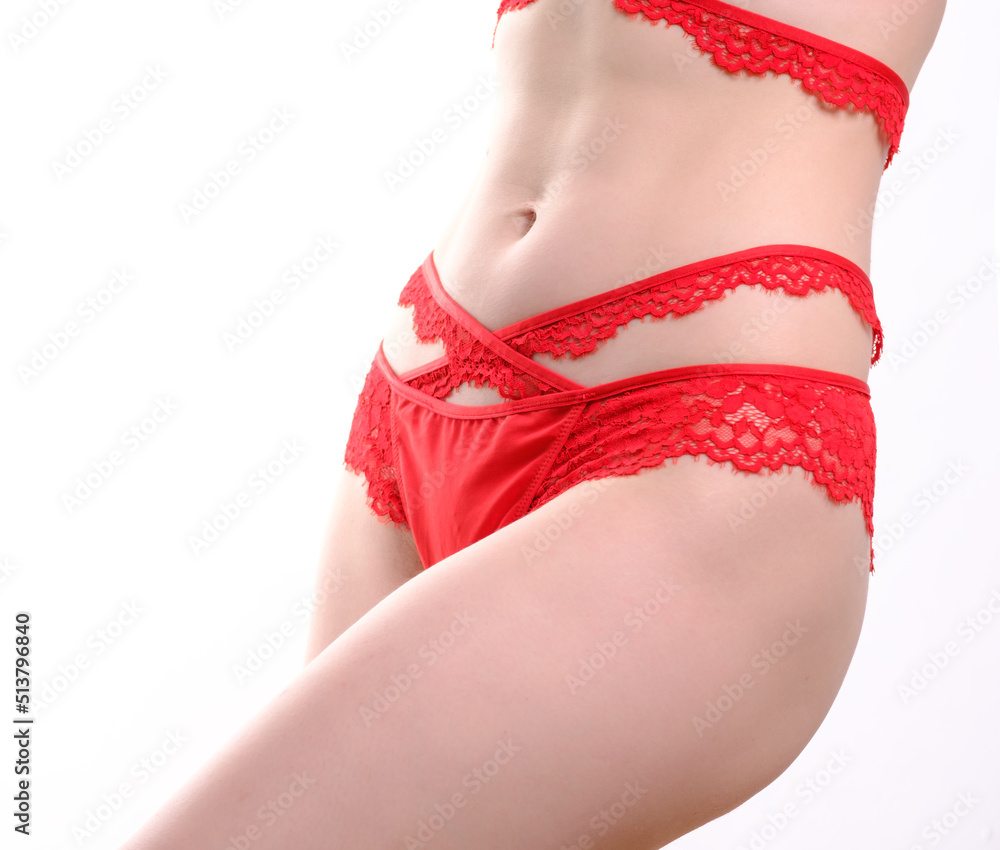 woman in red panties on white background woman in red panties on white background