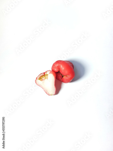 Two Bell-Fruits with leaves on white isolated background, photo