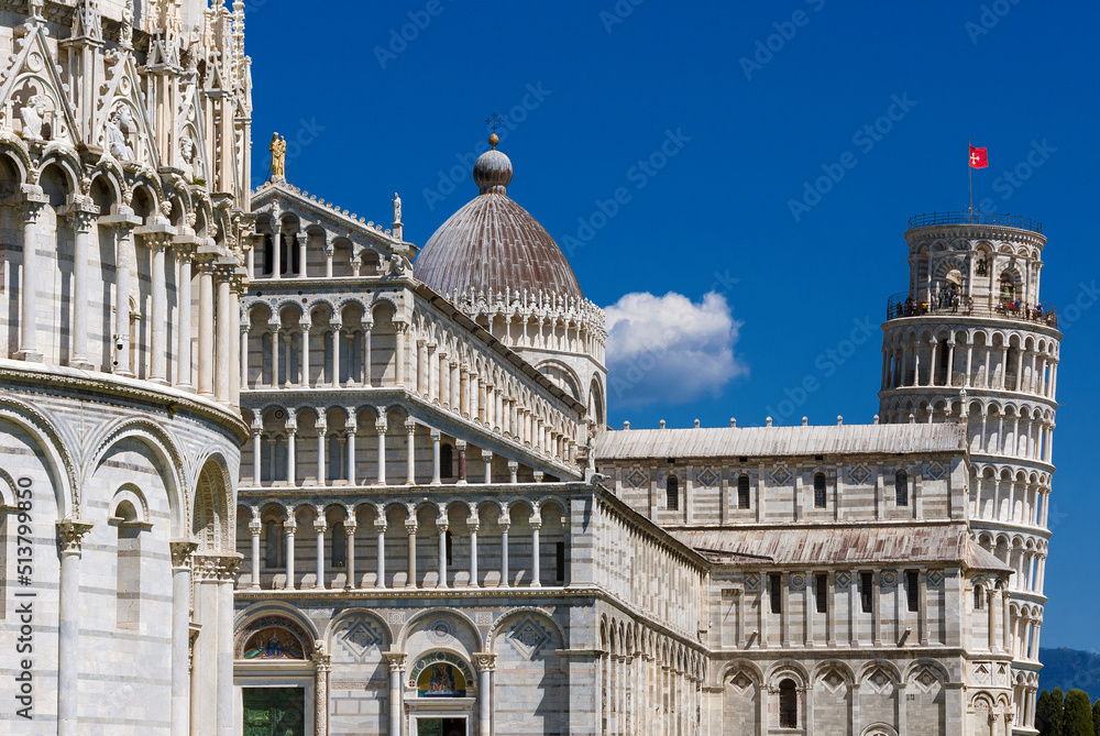 Pisa most famous three landmarks: Leaning Tower, Baptistery and Cathedral with blue sky and white clouds