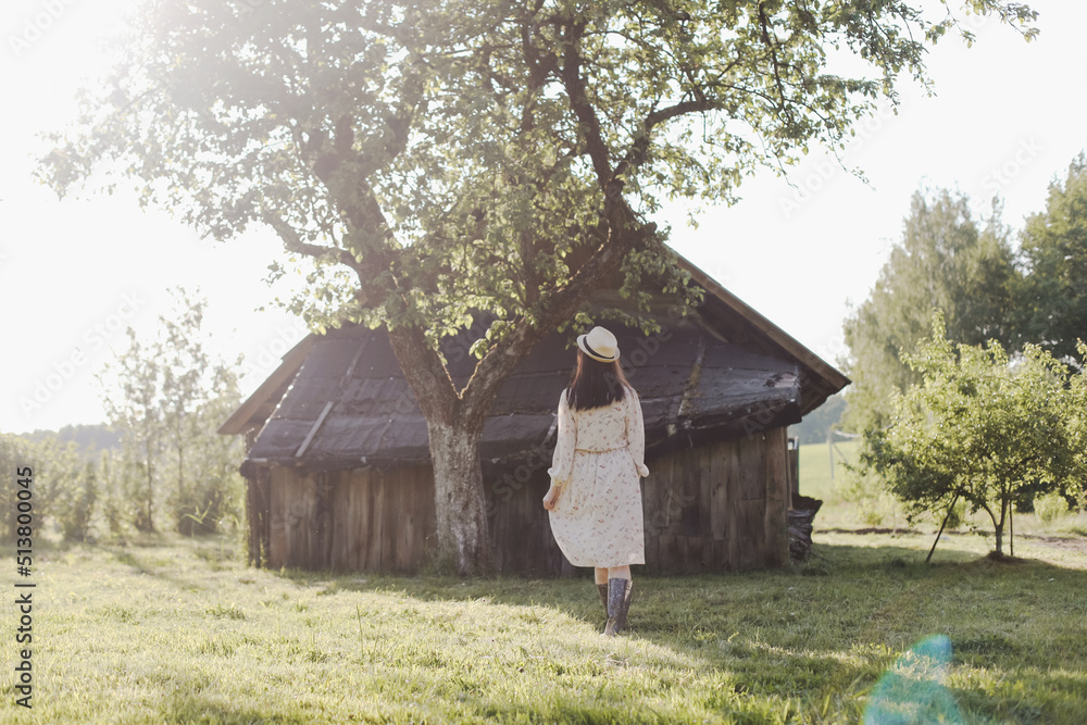 romantic portrait of a young woman in straw hat and beautiful dress in the countryside in summer romantic portrait of a young woman in straw hat and beautiful dress in the countryside in summer