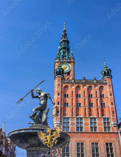 The famous fountain of Neptune and Main Town Hall in Gdansk, Poland