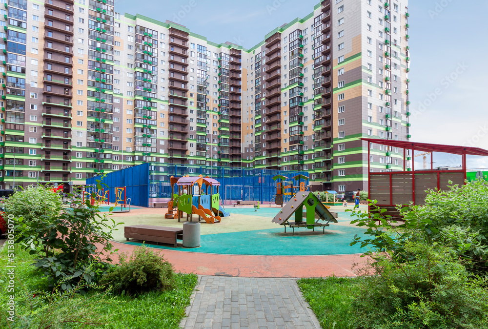Picture of City modern apartment mixed use building with kids playground ...