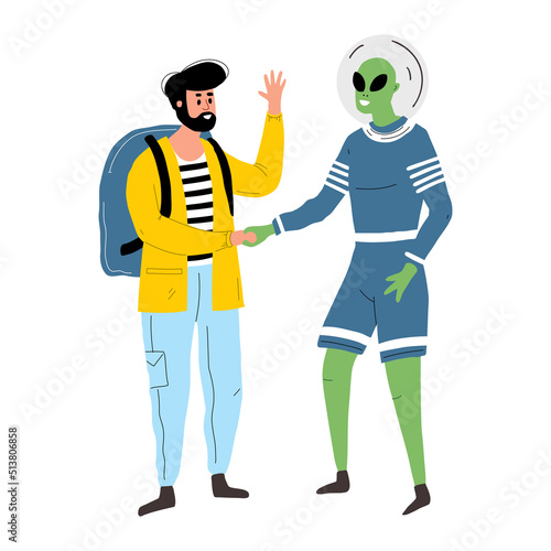 The ufologist shakes hands with the alien. A man greets a UFO. friendly martian and tourist