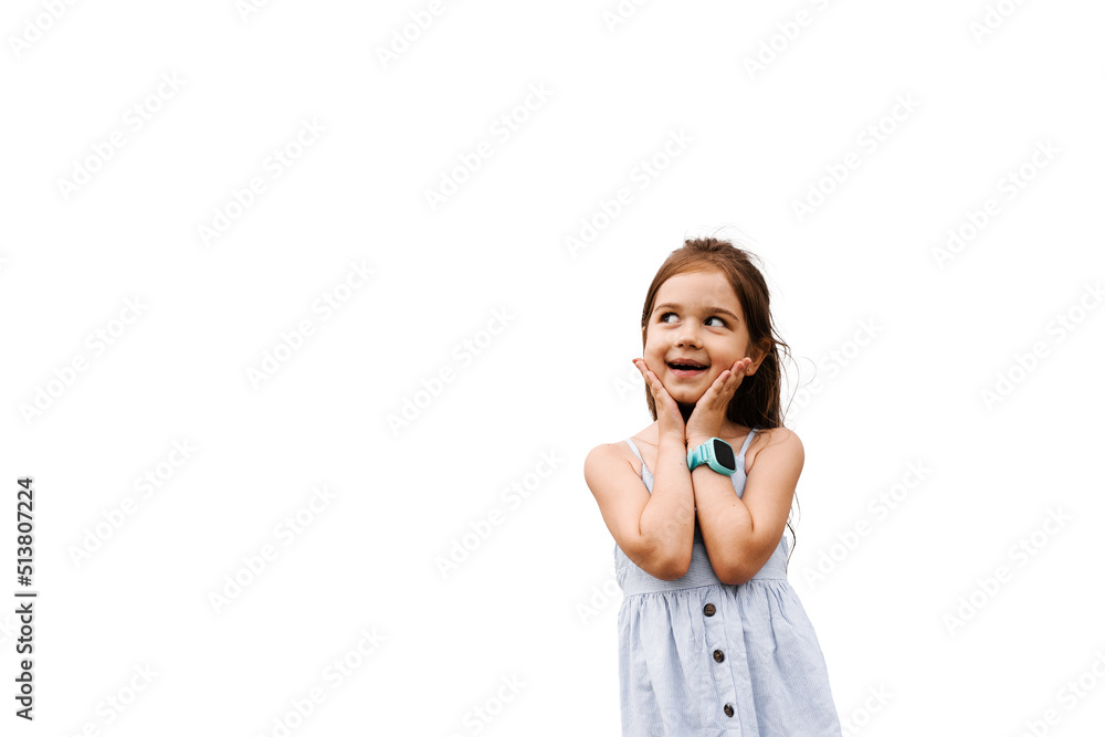 Curious adorable child girl on white background with empty place for advert. Interested kid toddler posing in studio. Curious adorable child girl on white background with empty place for advert. Interested kid toddler posing in studio.