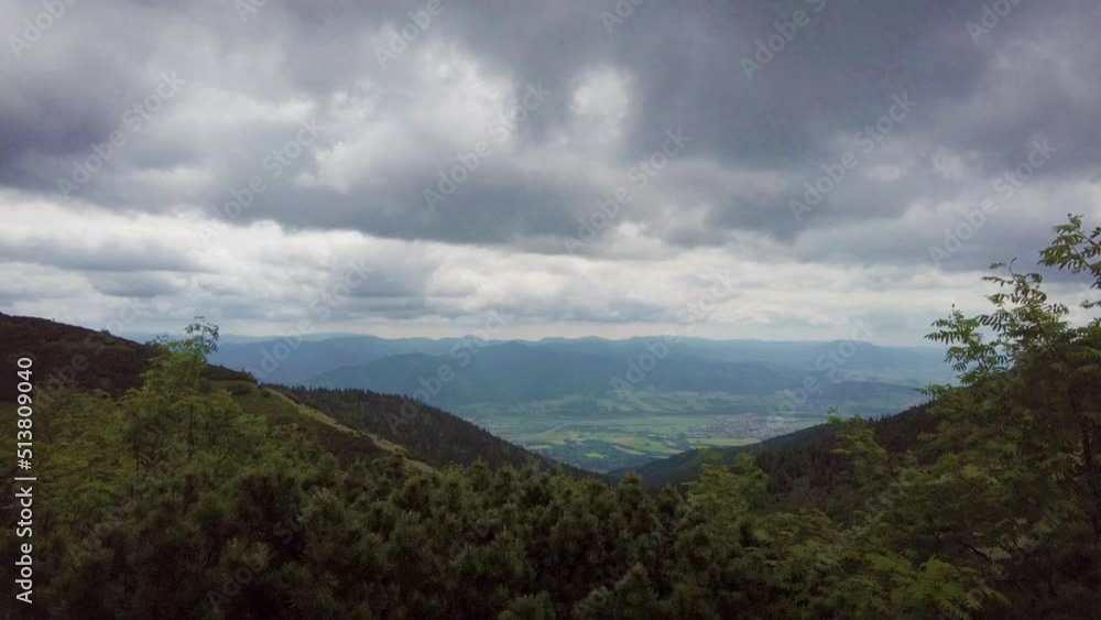 Natural landscape in the foothills of the High Tatras in the north of Slovakia in early summer with wide valleys and green meadows. Natural landscape in the foothills of the High Tatras in the north of Slovakia in early summer with wide valleys and green meadows.