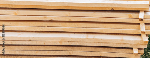 Wooden boards for building a house as a background