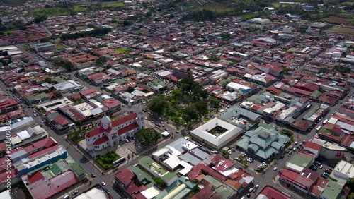 Beautiful cinematic aerial footage of San Ramon Church and town in Costa Rica photo