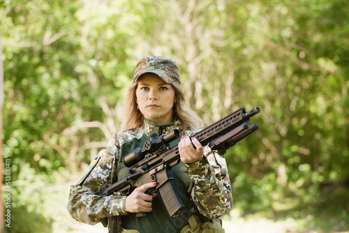 Ukrainian defender with a weapon machine gun