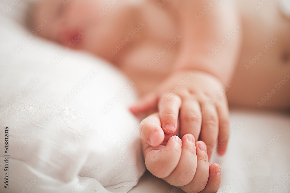 Cute little baby sleeping. Tiny infant`s hands in front. Cute little baby sleeping. Tiny infant`s hands in front.