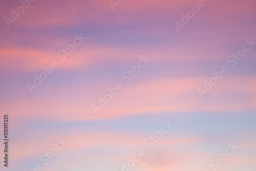 Majestic dusk. Sunset sky twilight in the evening with colorful sunlight. Pastel colors. Abstract nature background. Moody pink, purple clouds sunset sky with long shutter © Avalepsap