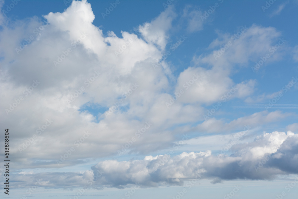 Fototapeta premium Fluffy white clouds and blue sky