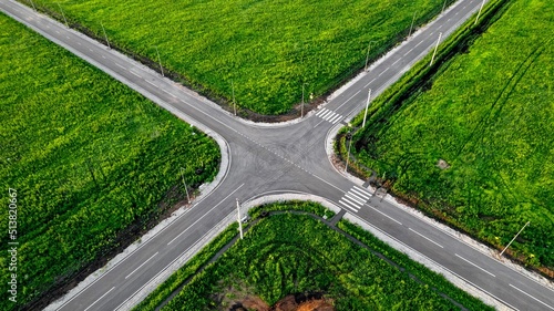  Aerial view of a flat automobile intersection. Static video. A flat road with markings. View from the height of the highway