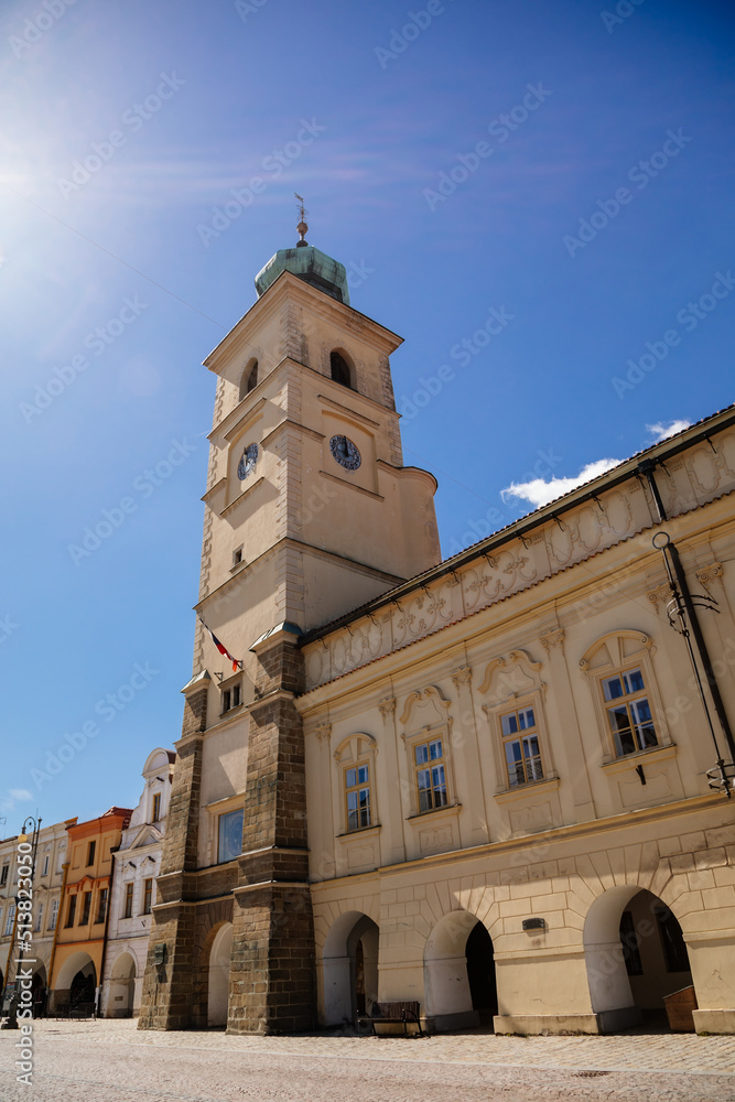 Litomysl, Czech Republic, 17 April 2022: old city or town hall with tower on main Smetana Square at sunny summer day, colorful renaissance and baroque buildings in center, picturesque street