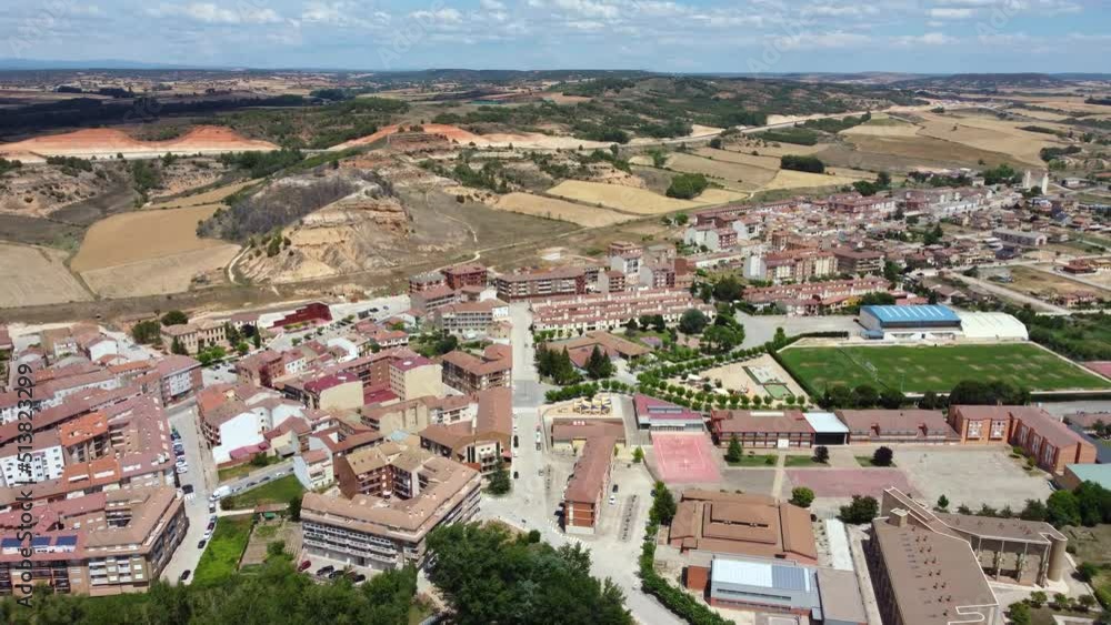 Aerial cinematic perspective of San Esteban de Gormaz situated in province of Soria - Spain. River Duerdo crossing the city. Beautiful architecture with small streets and houses built in the mountains Aerial cinematic perspective of San Esteban de Gormaz situated in province of Soria - Spain. River Duerdo crossing the city. Beautiful architecture with small streets and houses built in the mountains