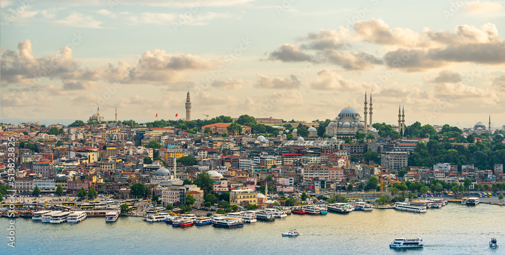Istanbul panorama with mosque at sunset, aerial view of old town, bridge and Golden horn strait, Turkey